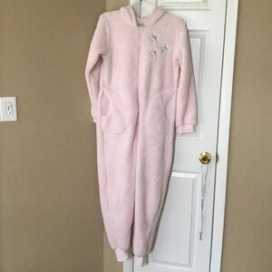One piece pink unicorn pajamas.